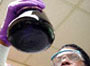 Lab worker with beaker