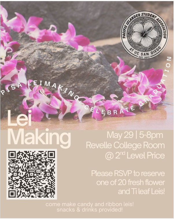 flowers around a rock sitting in wet sand