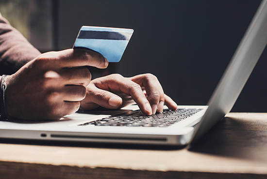 Credit card and laptop