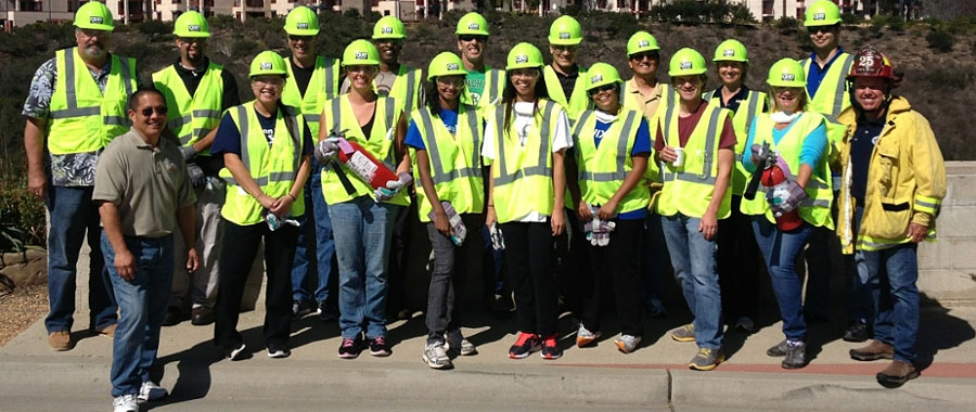 1 of 3, Group of UC San Diego staff and safety experts all decked out in safety gear - CERT Class / Training for Emergency Preparedness