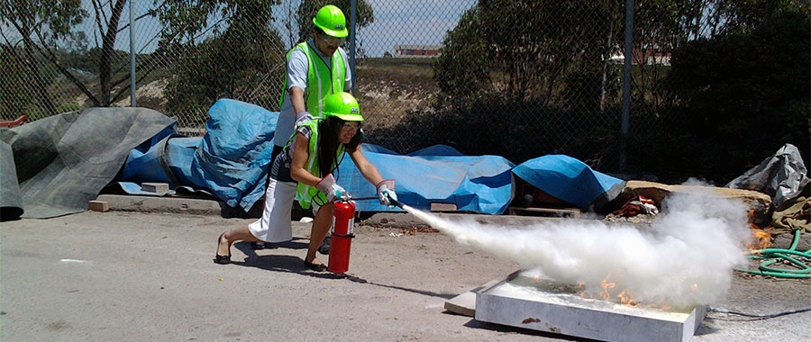 3 of 3, UC San Diego staff practices using fire extinguisher - CERT Class / Training for Emergency Preparedness