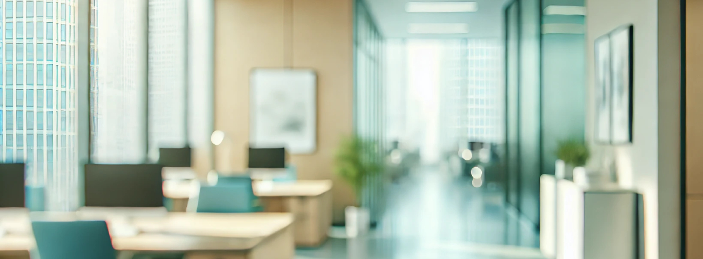 Image of empty office with desks and windows of a high floor office