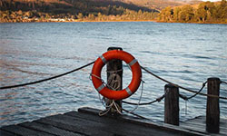 Life preserver on a lakeside dock