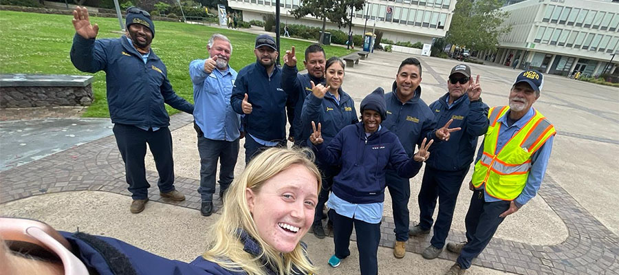 5 of 5, Employees UC San Diego, smiling and taking a group selfie