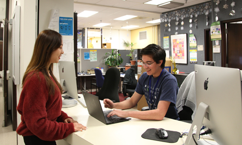 Students at front desk